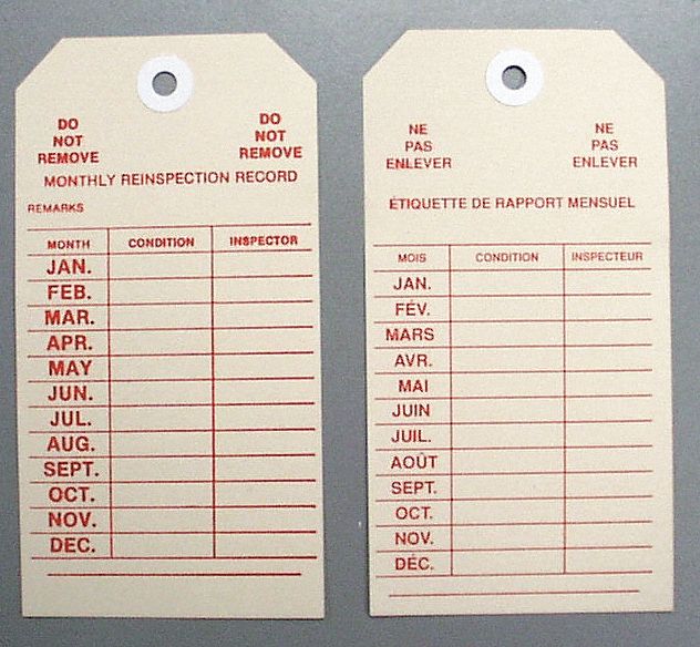 MONTHLY INSPECTION TAG, FRENCH, TAN, 2 5/8 X 5 1/4 IN