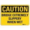 Caution: Bridge Extremely Slippery When Wet Signs