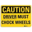 Caution: Driver Must Chock Wheels Signs