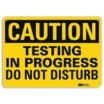 Caution: Testing In Progress Do Not Disturb Signs