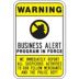 Warning: Business Alert Program In Force We Immediately Report All Suspicious Activities To Our Fellow Merchants And The Police Dept Signs