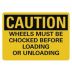 Caution: Wheels Must Be Chocked Before Loading And Unloading Signs