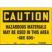 Caution: Hazardous Materials May Be Used In This Area See SDS Signs