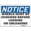 Notice: Wheels Must Be Chocked Before Loading Or Unloading Signs image