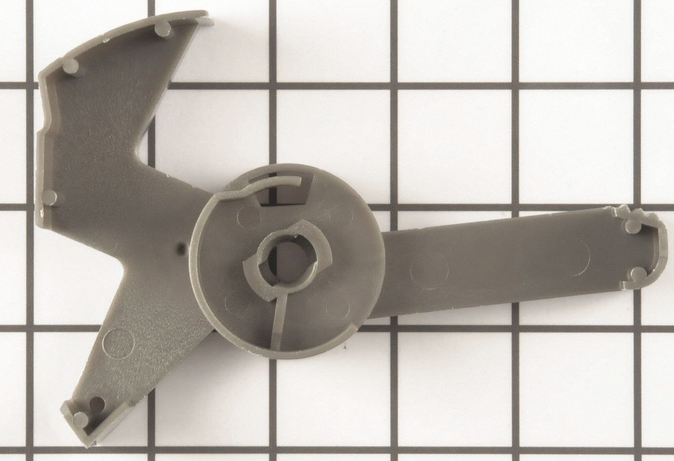 Detergent Cup Release Arm