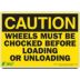 Caution: Wheels Must Be Chocked Before Loading or Unloading Signs