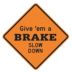 LYLE Give em a Brake Slow Down Signs - Grainger Industrial Supply