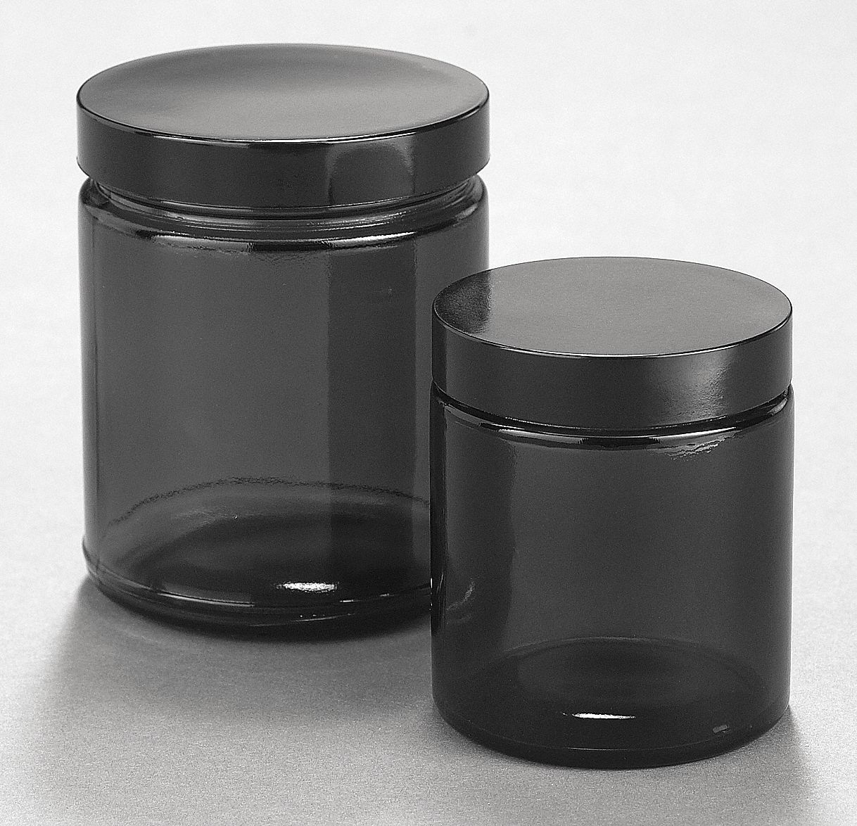 black glass jars        
        <figure class=