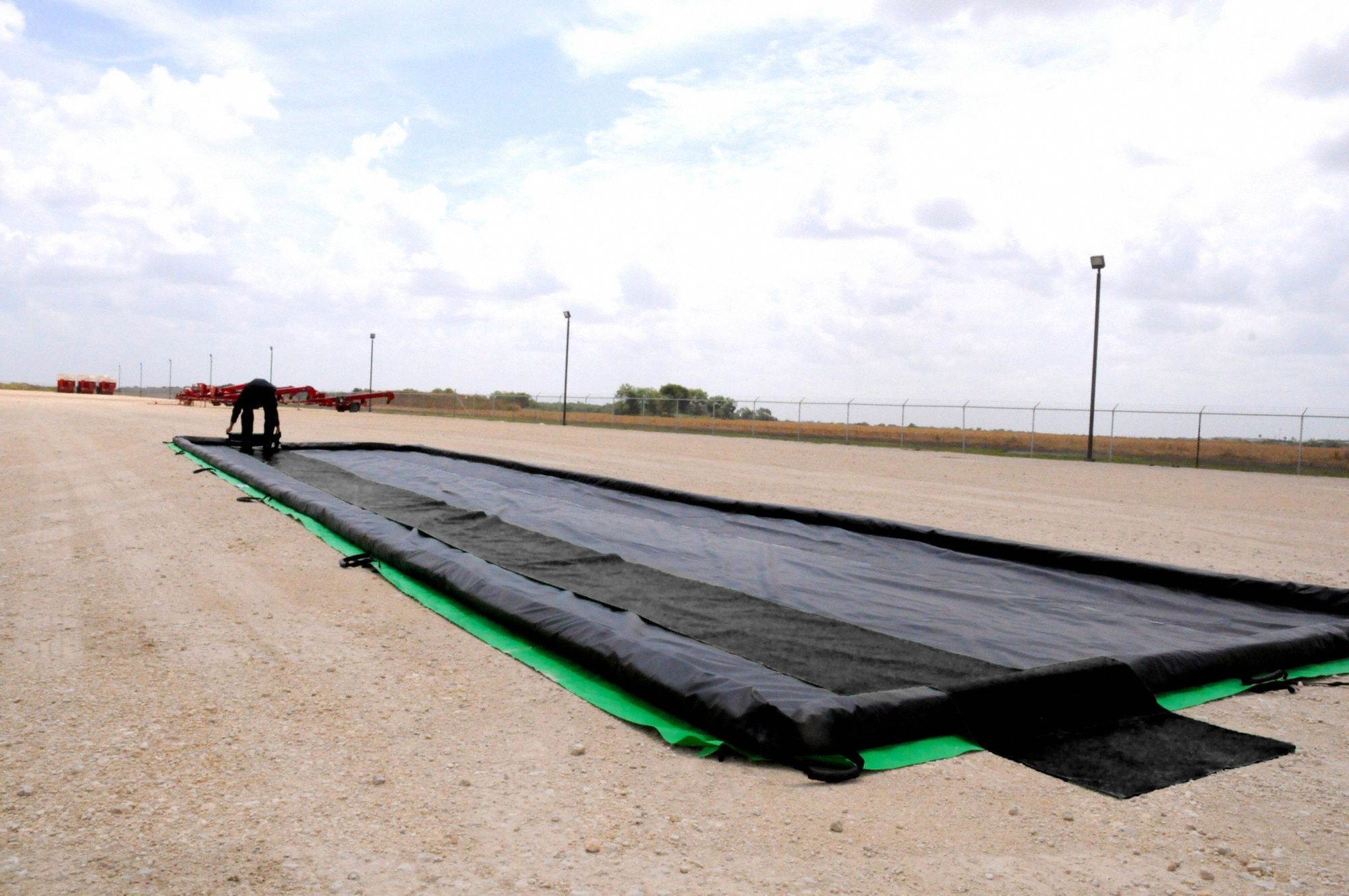 Collapsible Spill Berm Traction Mats: 30 in x 56 ft, 2 Traction Mats, Black